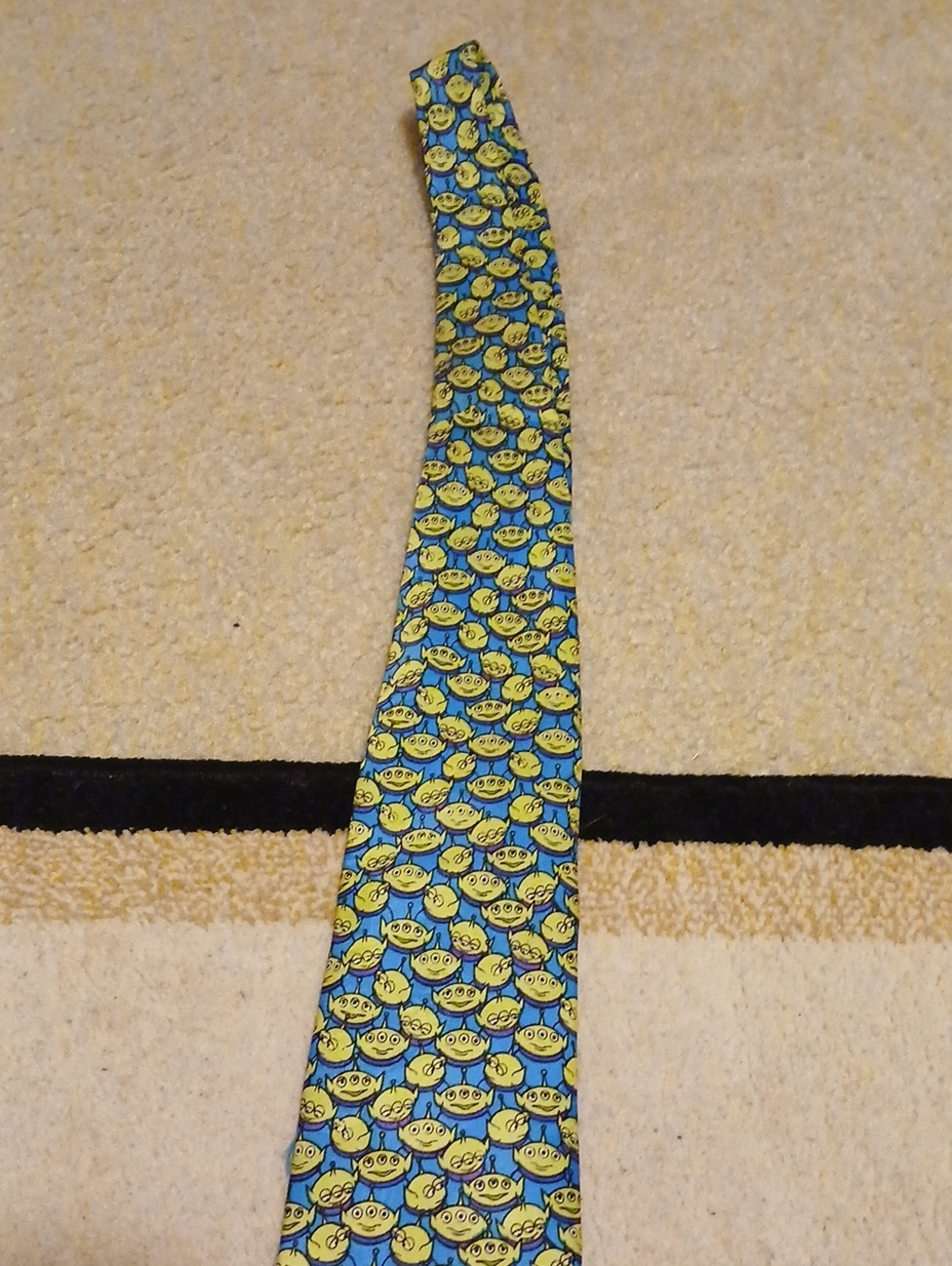 Disney Blue Tie with Yellow Alien Smile Pattern Toy Story Tie